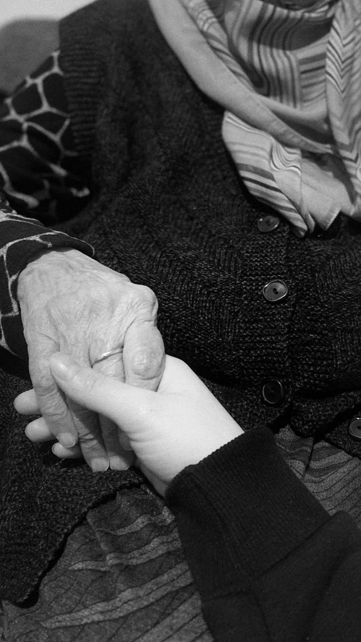 touching moment of generational connection in black and white