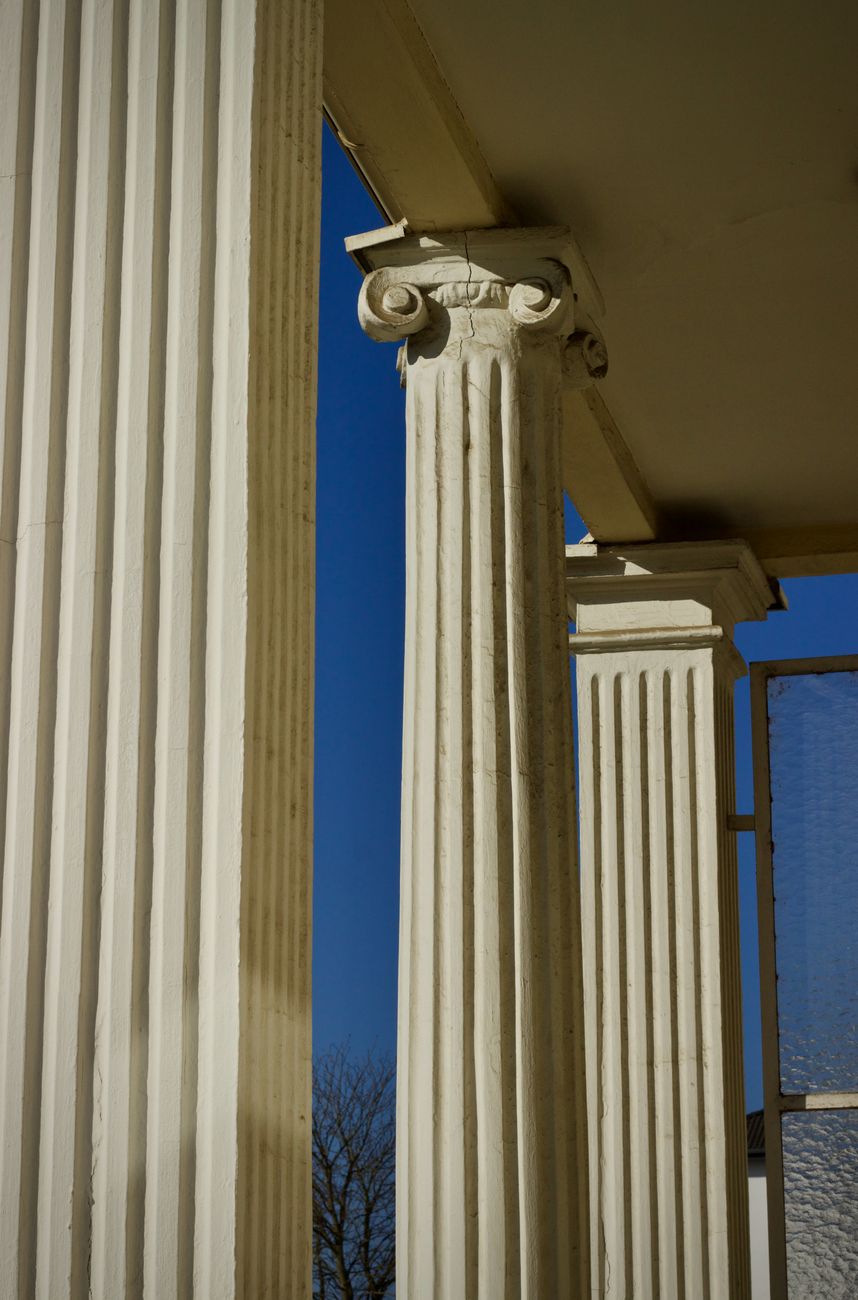 elegant classical columns on sunny day
