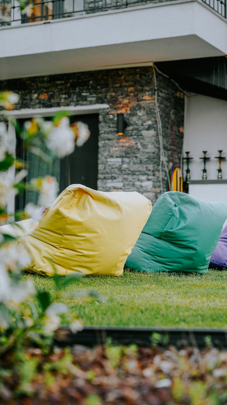 colorful sitting sacks on the ground in the garden