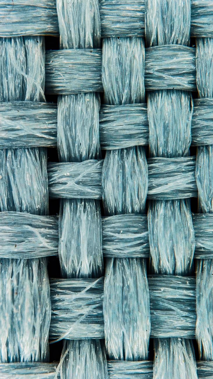 close up of blue woven textile pattern