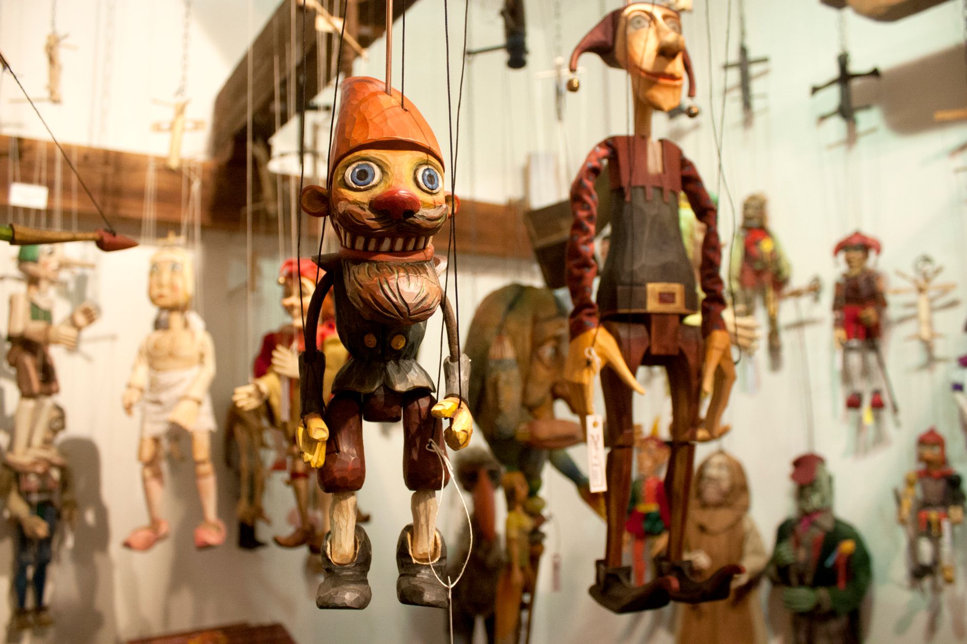hanging wooden marionettes