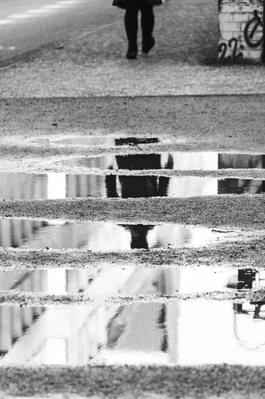 monochrome reflection of urban passerby