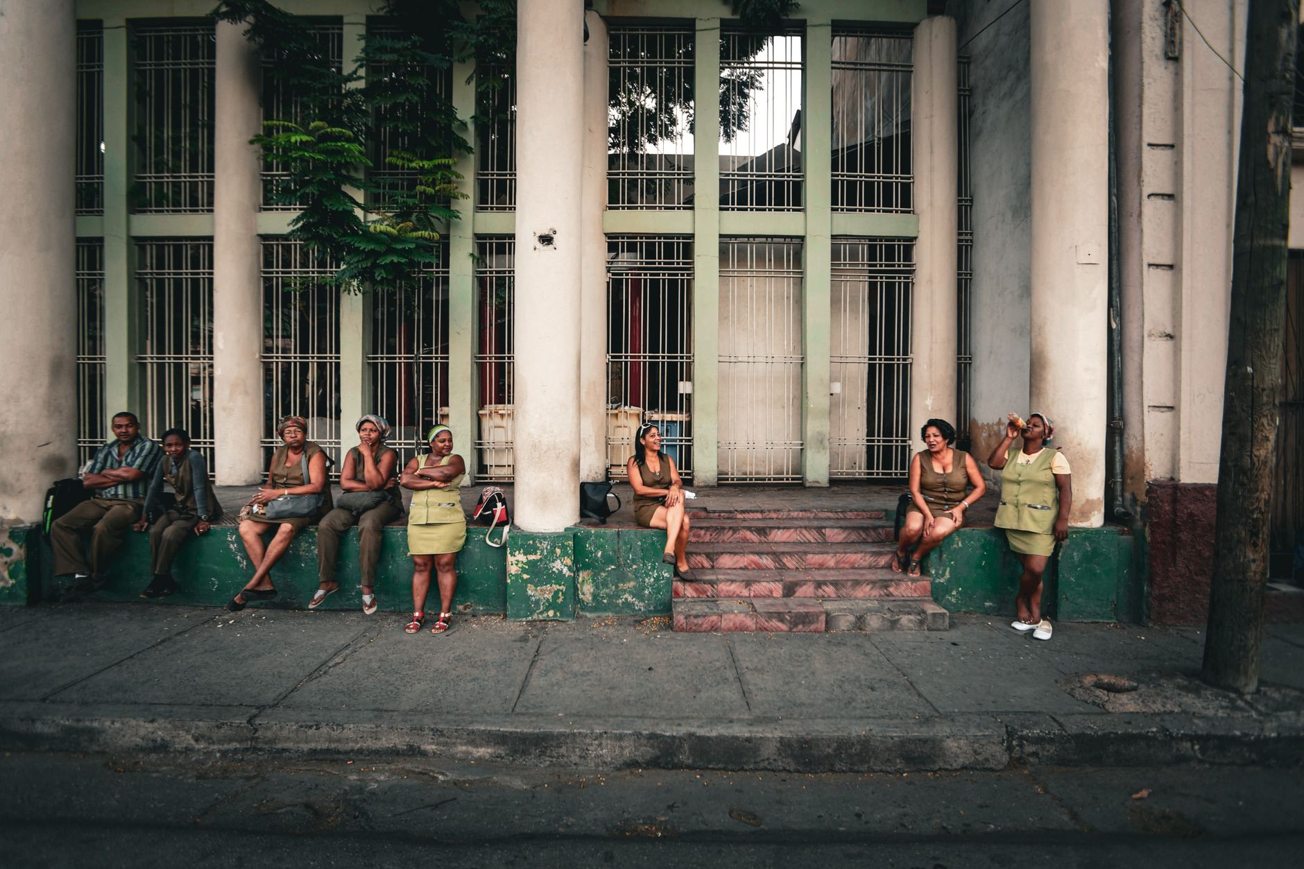 women and men near building