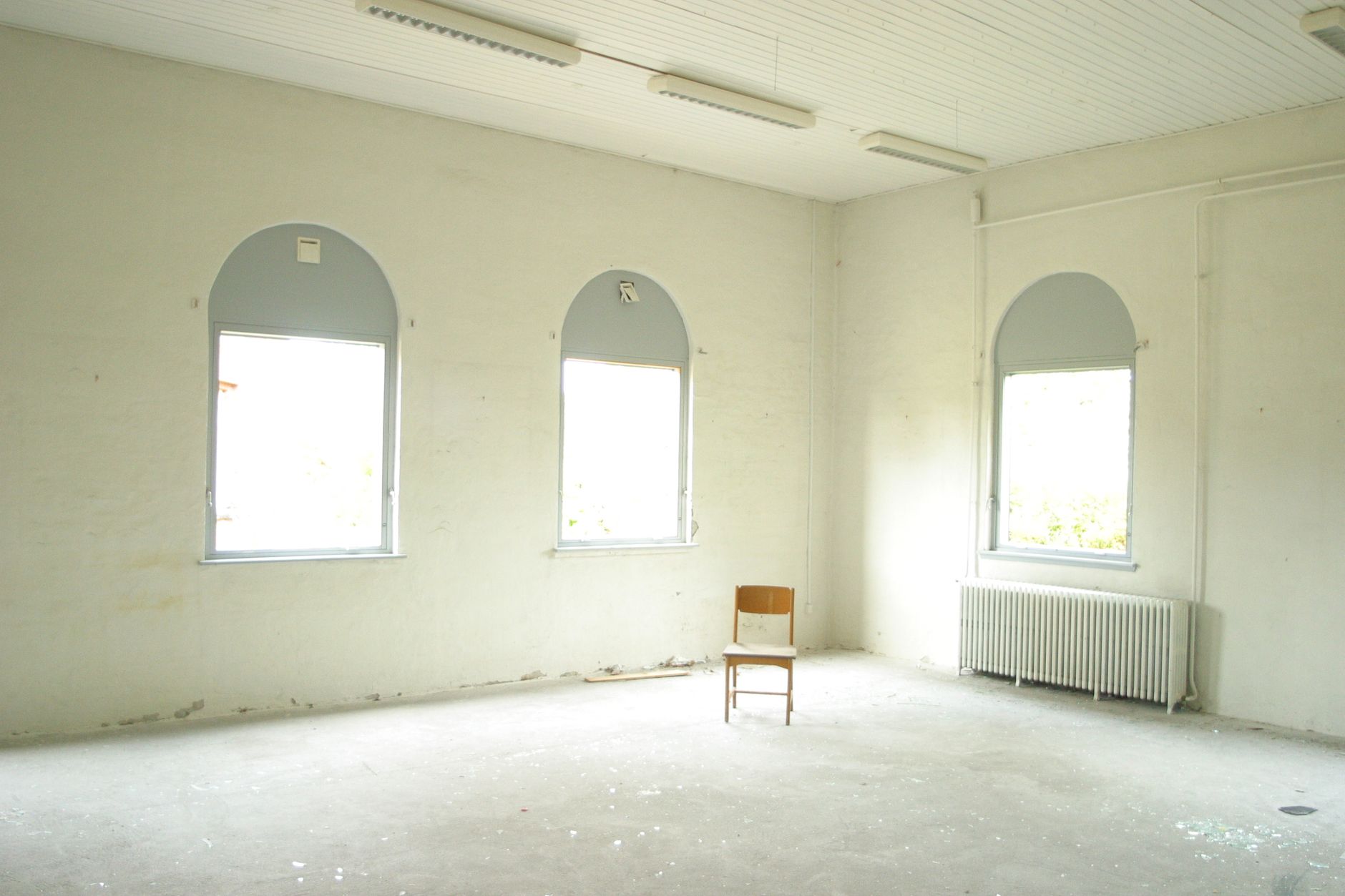 wooden chair in empty room