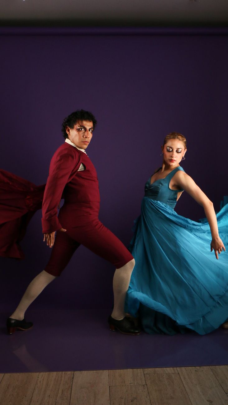 elegant ballroom dance in colorful costumes