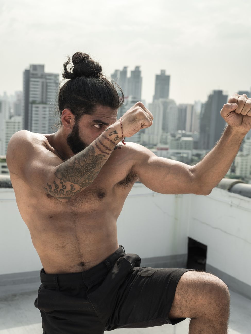 man in black shorts doing martial art